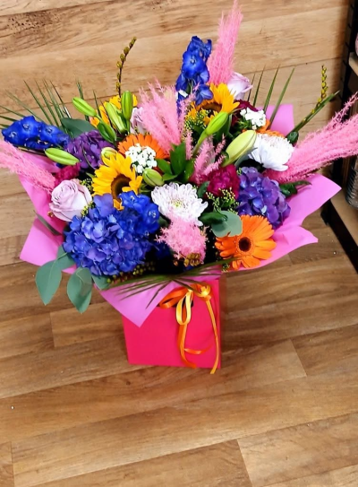 Bright bloom - Bright colours of flowers arranged in aqua box