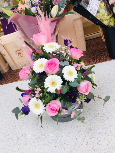 Pretty pinks - Beautiful pink hatbox arrangement